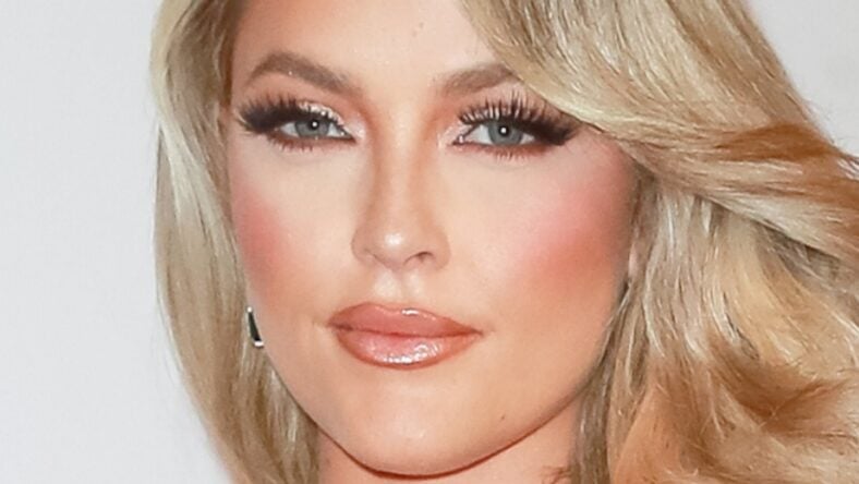 Alexis Texas In Tight Pool Bikini Advises ‘Caution When Wet’