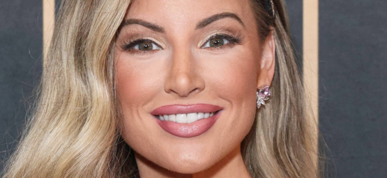 Ashley Alexiss Highlights Her ’30GGs’ In Plunging Snakeskin Bikini