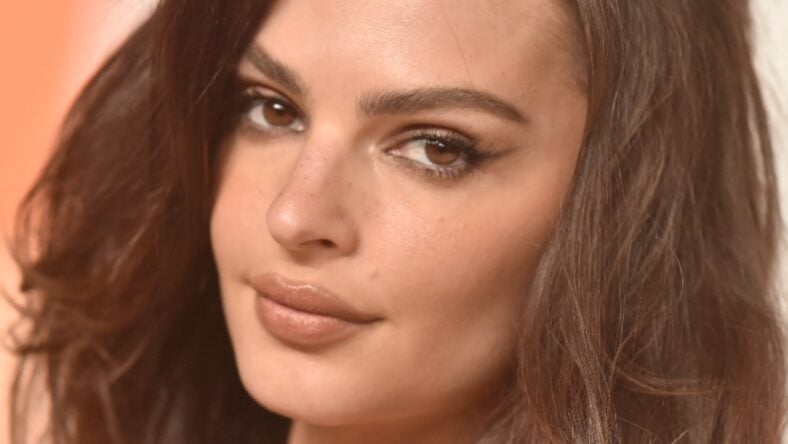 Emily Ratajkowski Exposes Her ‘Nice Rack’ In Rolled-Down Swimsuit In The Ocean
