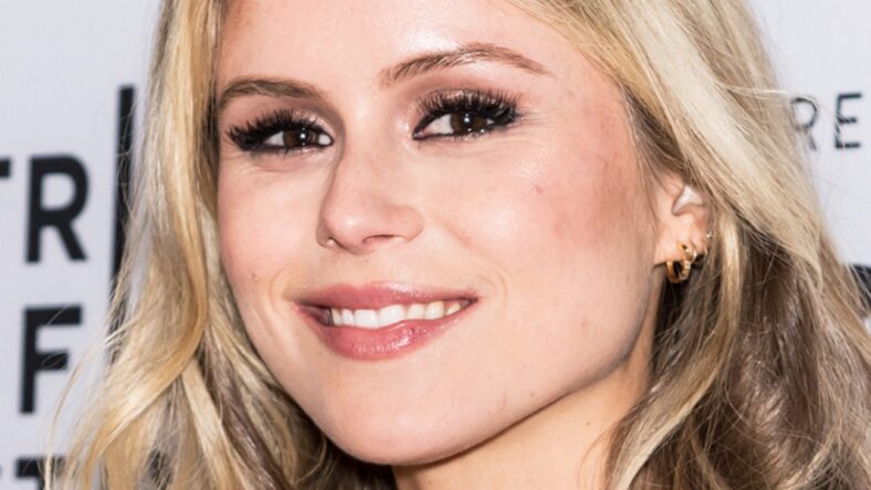 Erin Moriarty In Plunging Braless Dress Congratulated On Her Top ‘Tier Milk’