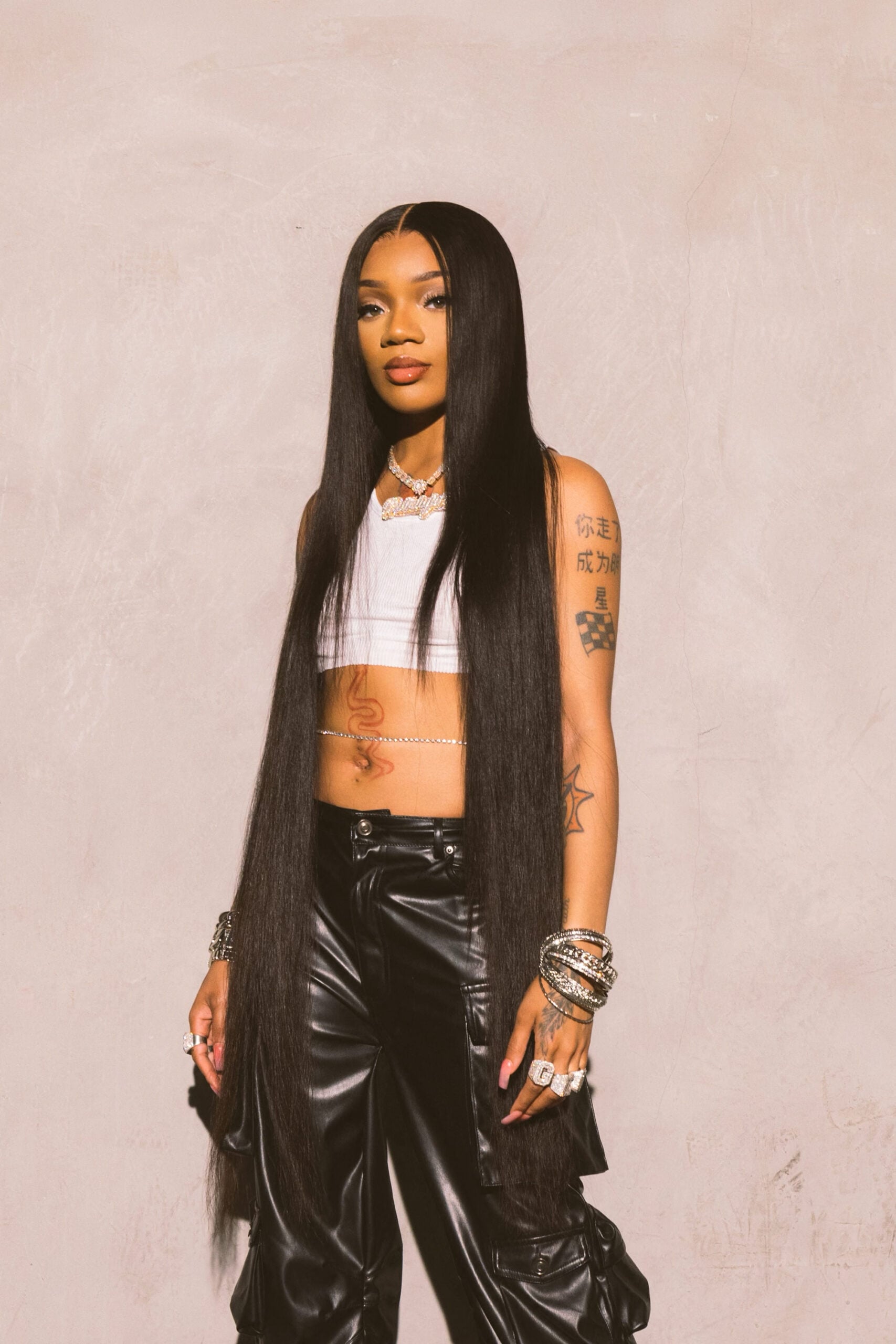 GloRilla Shuts Down Pregnancy Rumors With Bold Bikini Photos