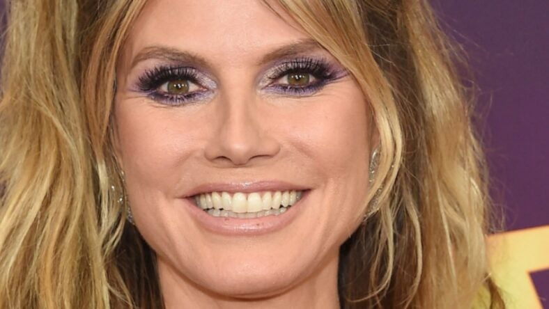 Heidi Klum Removes Bikini Top Poolside To Celebrate The Weekend