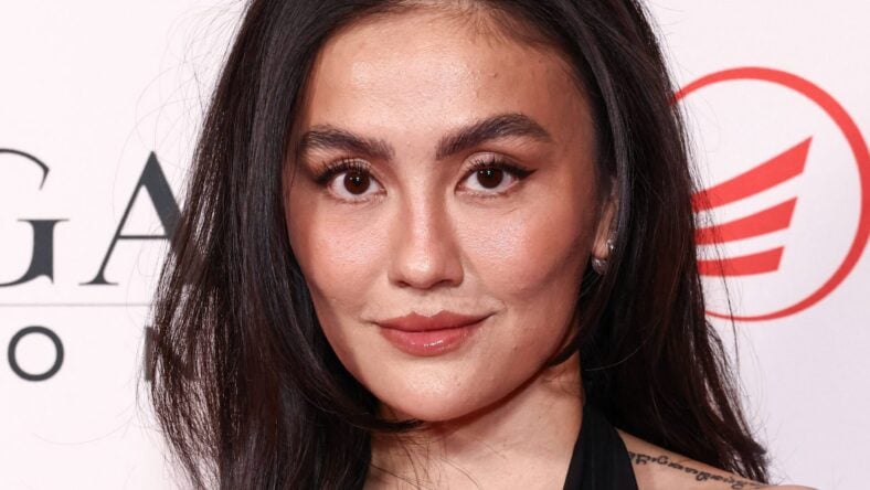 ‘Reacher’ Star Agnez Mo Highlights ‘Big Rack’ In Plunging Black Gown At Beverly Hills Gala