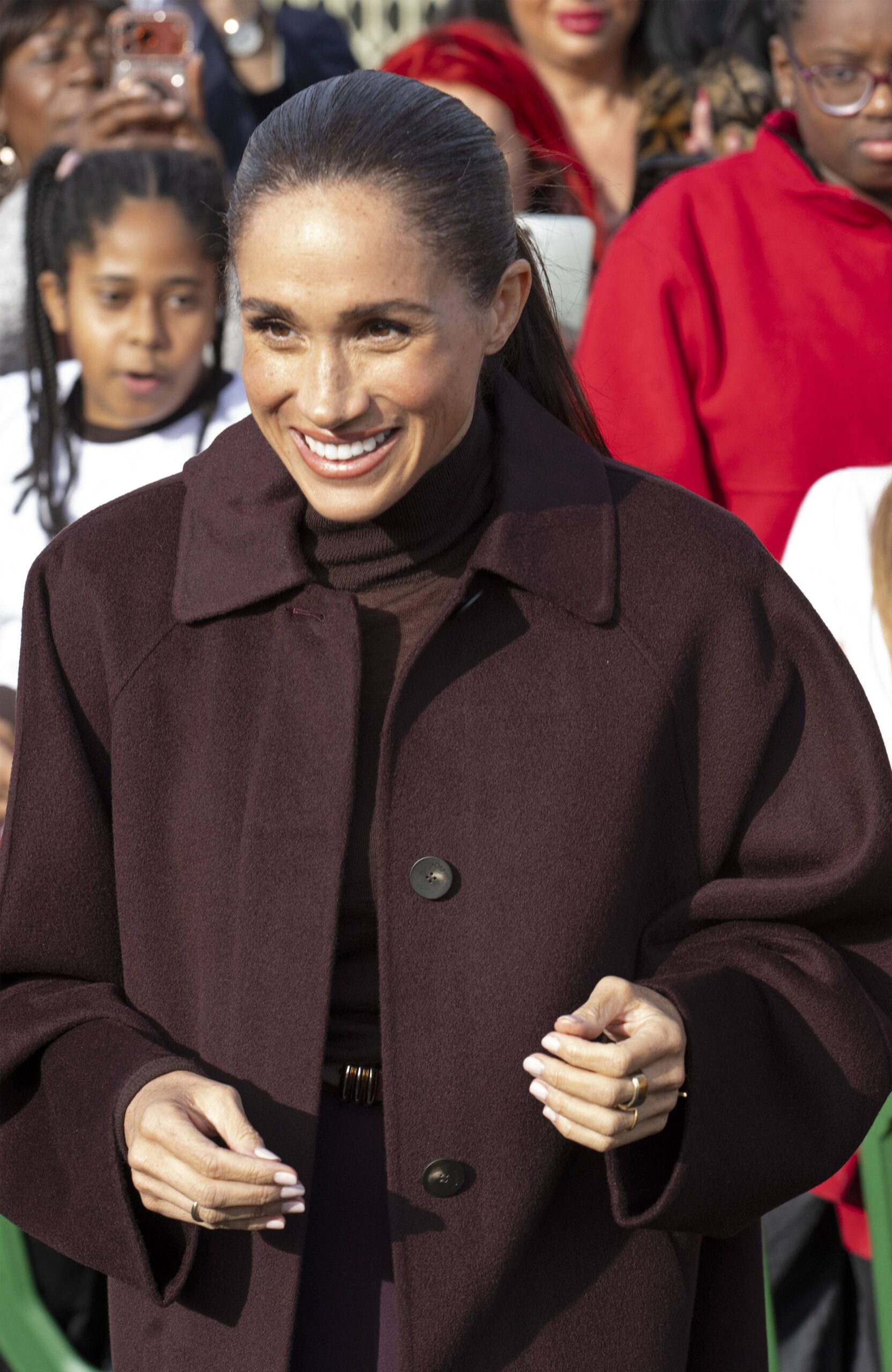 The Woman Behind Meghan Markle’s Viral Food Bank Moment Isn’t Who Fans Thought